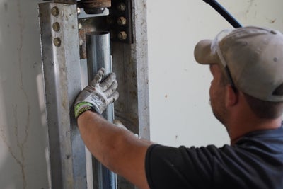 crew installing push piers