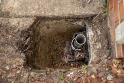 Foundation pier attached to a home's concrete footing.