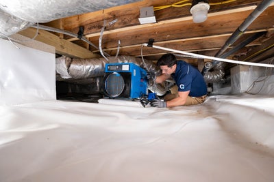 A Groundworks worker installed a crawl space dehumidifier.