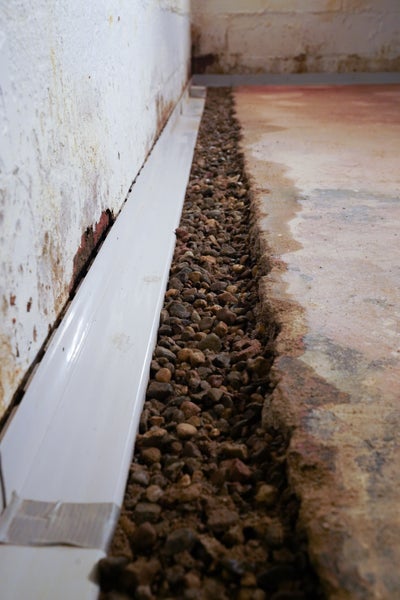 Interior drainage being installed in the basement.