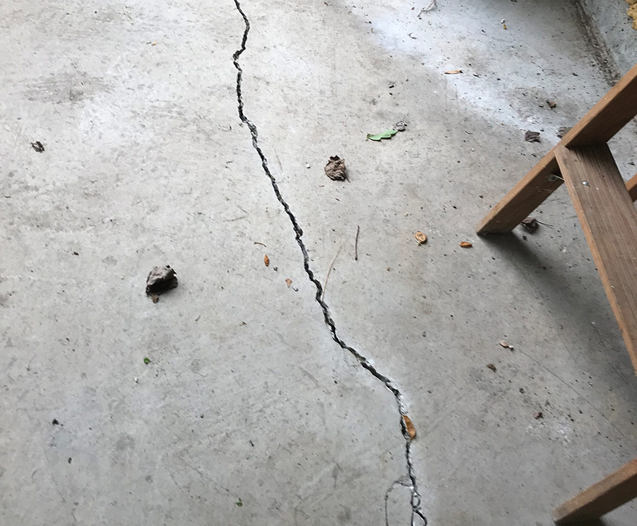 Large crack running across concrete floor