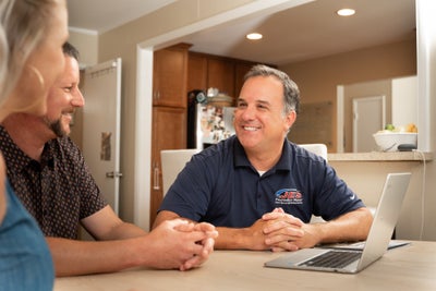 JES inspector meeting with homeowners