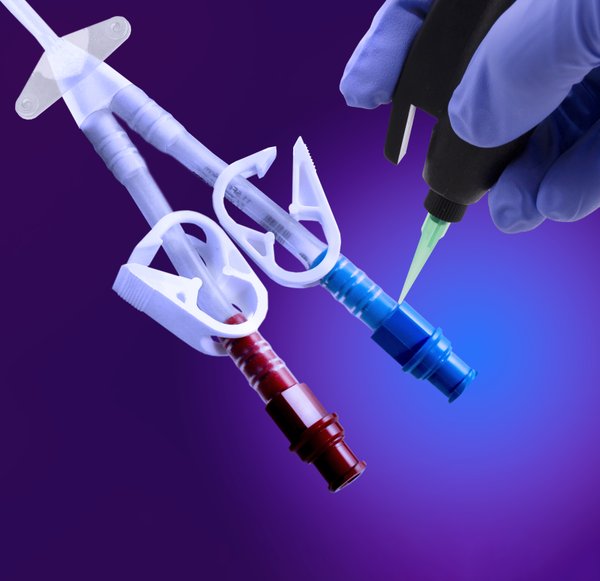 Dymax HLC™ Hybrid Light-Curable Adhesive Being Dispensed onto Tubing and Connector