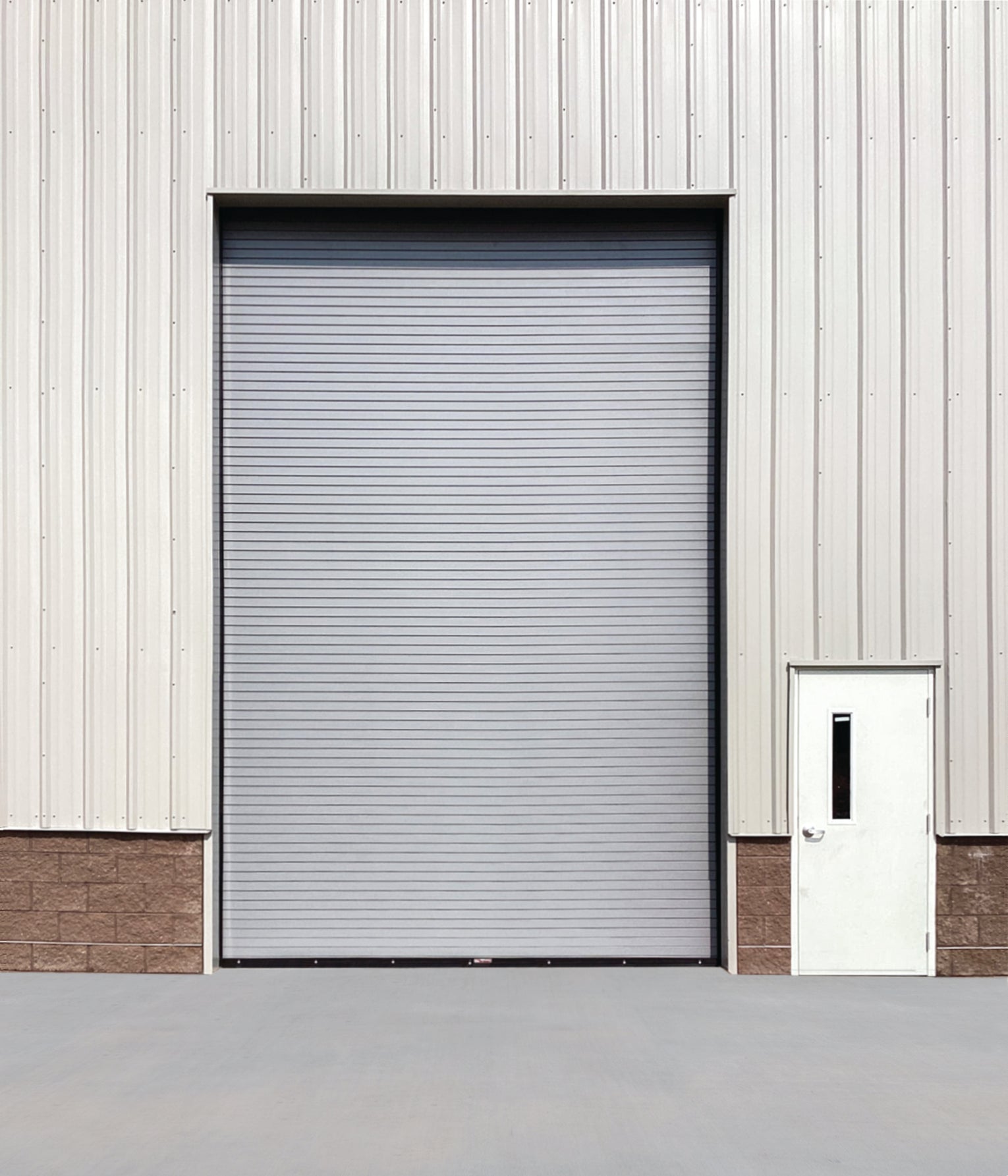 Rolling coil commercial door