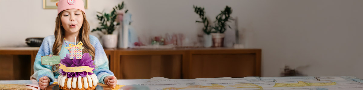 Happy Bundt day Bundt Cake with red bow and party hat