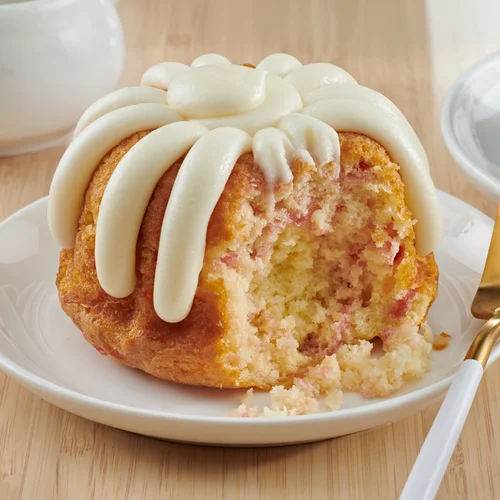 Lemon Raspberry Bundtlet and signature frosting on top - Shop Bundtlets & Towers