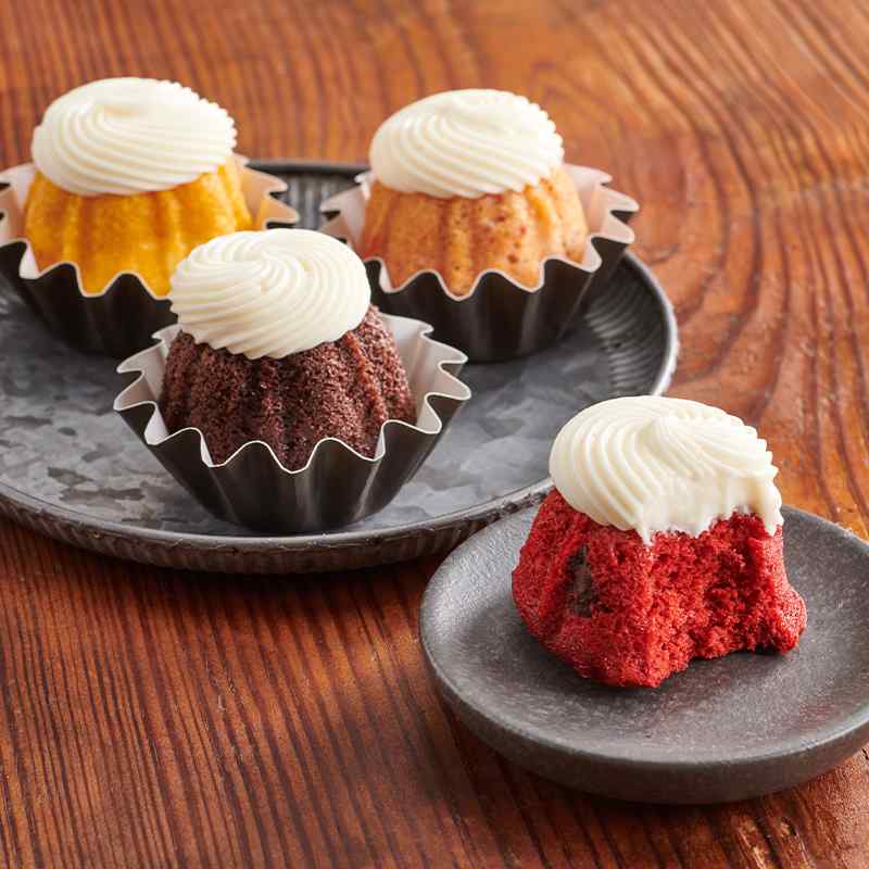 Pumpkin Spice flavor, mini Bundt cakes crowned with cream cheese - Shop Bundtinis