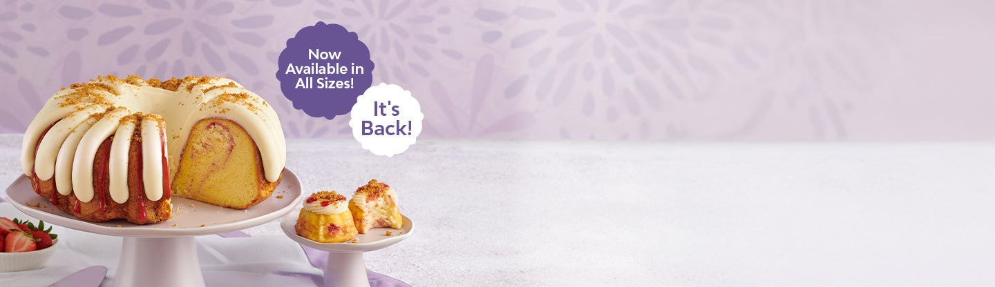 CLASSIC WHITE CAKE SWIRLED WITH CREAMY CHEESECAKE
FILLING  AND DRIZZLED WITH REAL STRAWBERRY GLAZE