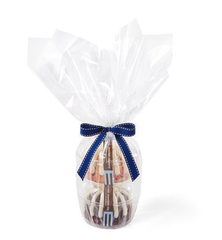 A set of two frosted Bundtlets stacked and wrapped in clear cellophane, tied with a navy blue ribbon.
