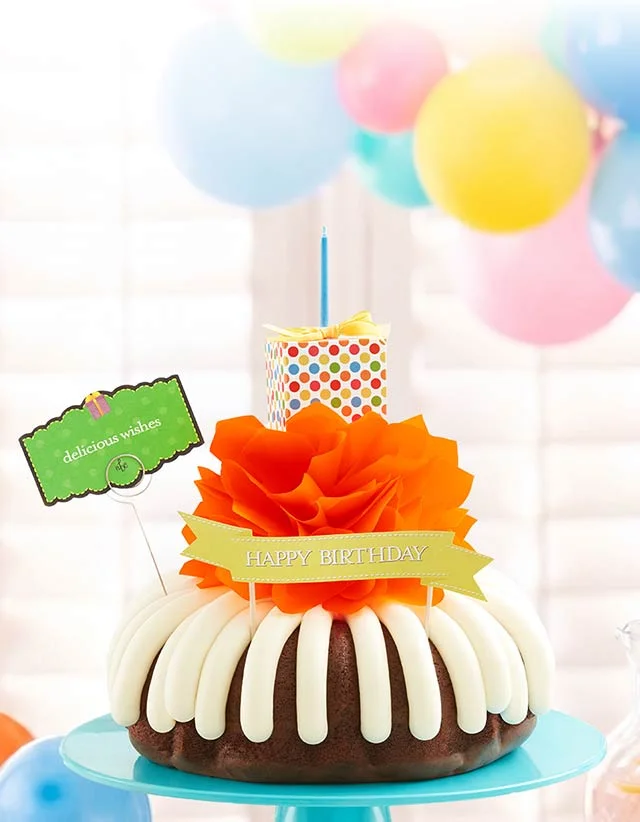 Build-A-Birthday Cake with birthday-themed decorations.