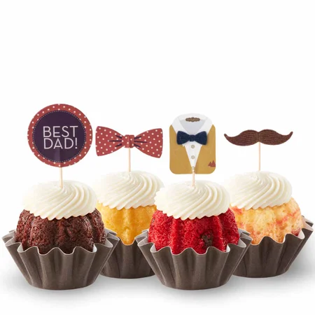 Assorted Buntinis with frosting topped with Best Dad decorations.