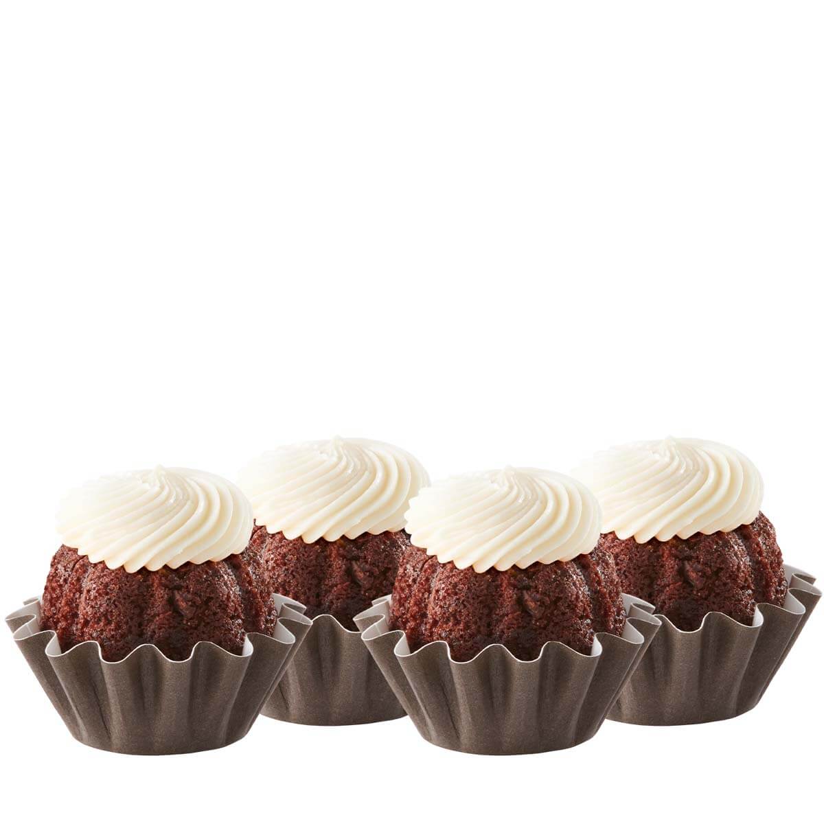 Four Chocolate Chocolate Chip Bundtinis sitting in a row.