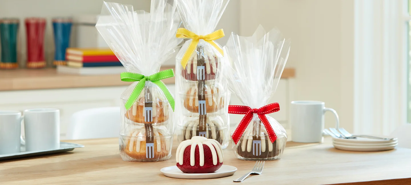 Bundtlet Tower gifts wrapped in cellophane with decorative ribbons.