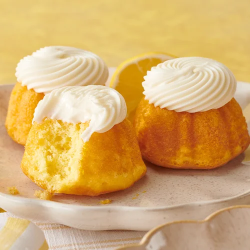 Lemon Bundtinis crowned with signature frosting - Shop Bundtinis