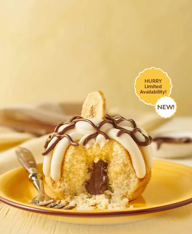 Banana Cake filled and drizzled with Nutella® then crowned in our signature cream cheese frosting - Limited Availability.