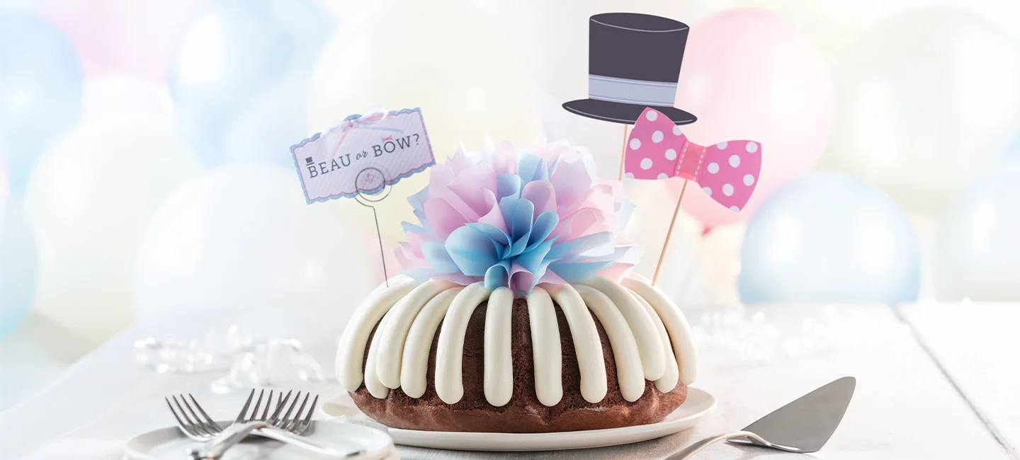 Bundt cake decorated for a gender reveal celebration.