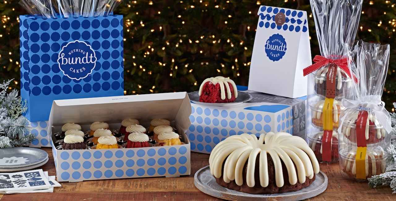 Bundt Cakes, Bundtlets, and Bundtinis on a wooden table