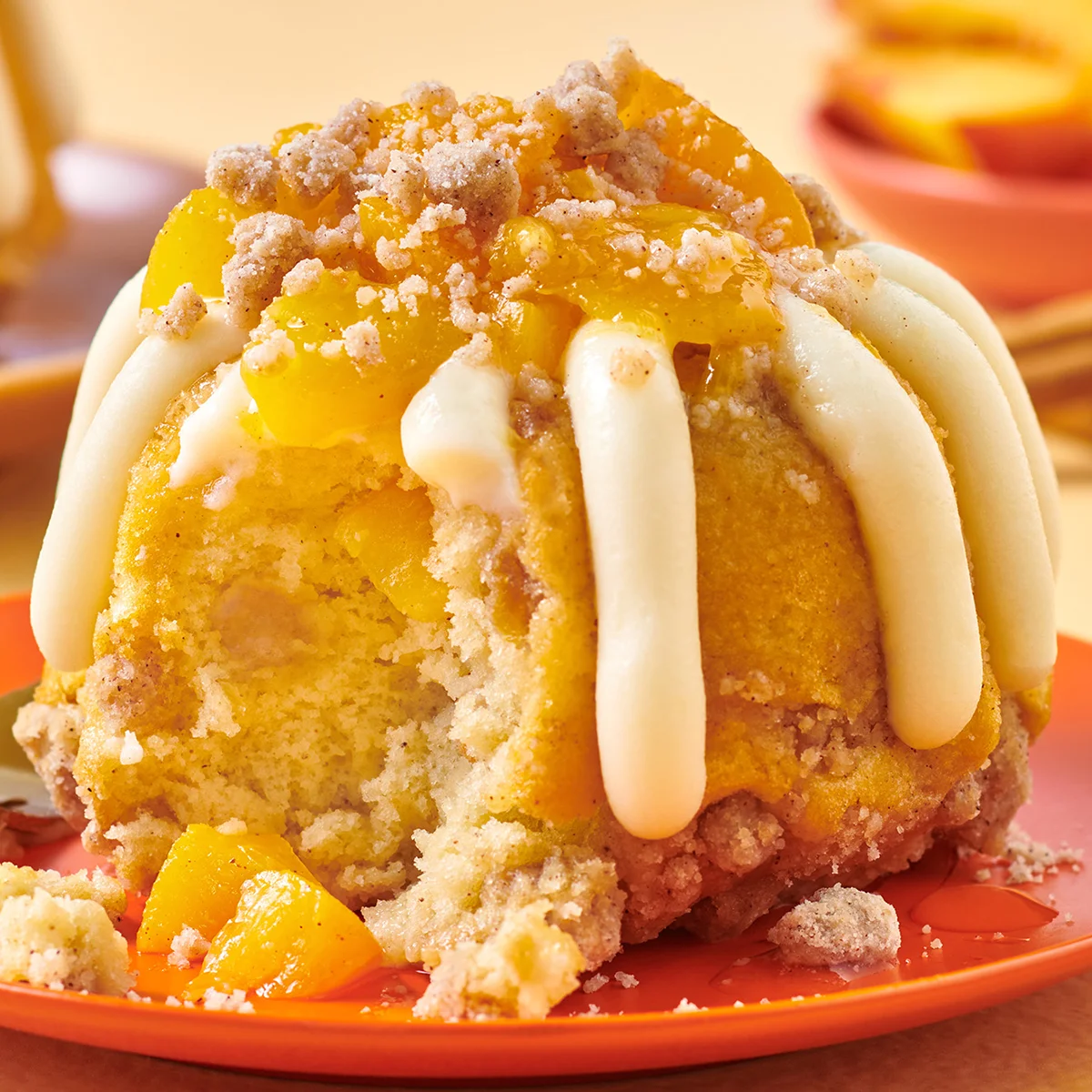A personal Peach Cobbler Cake Bundtlet crowned with our signature frosting.