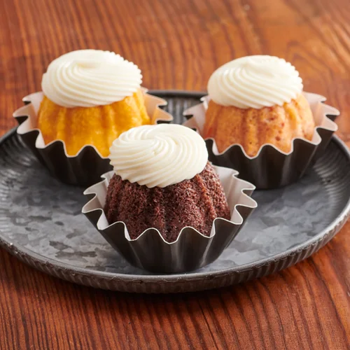 Assorted Bundtinis crowned with signature frosting - Shop Bundtinis