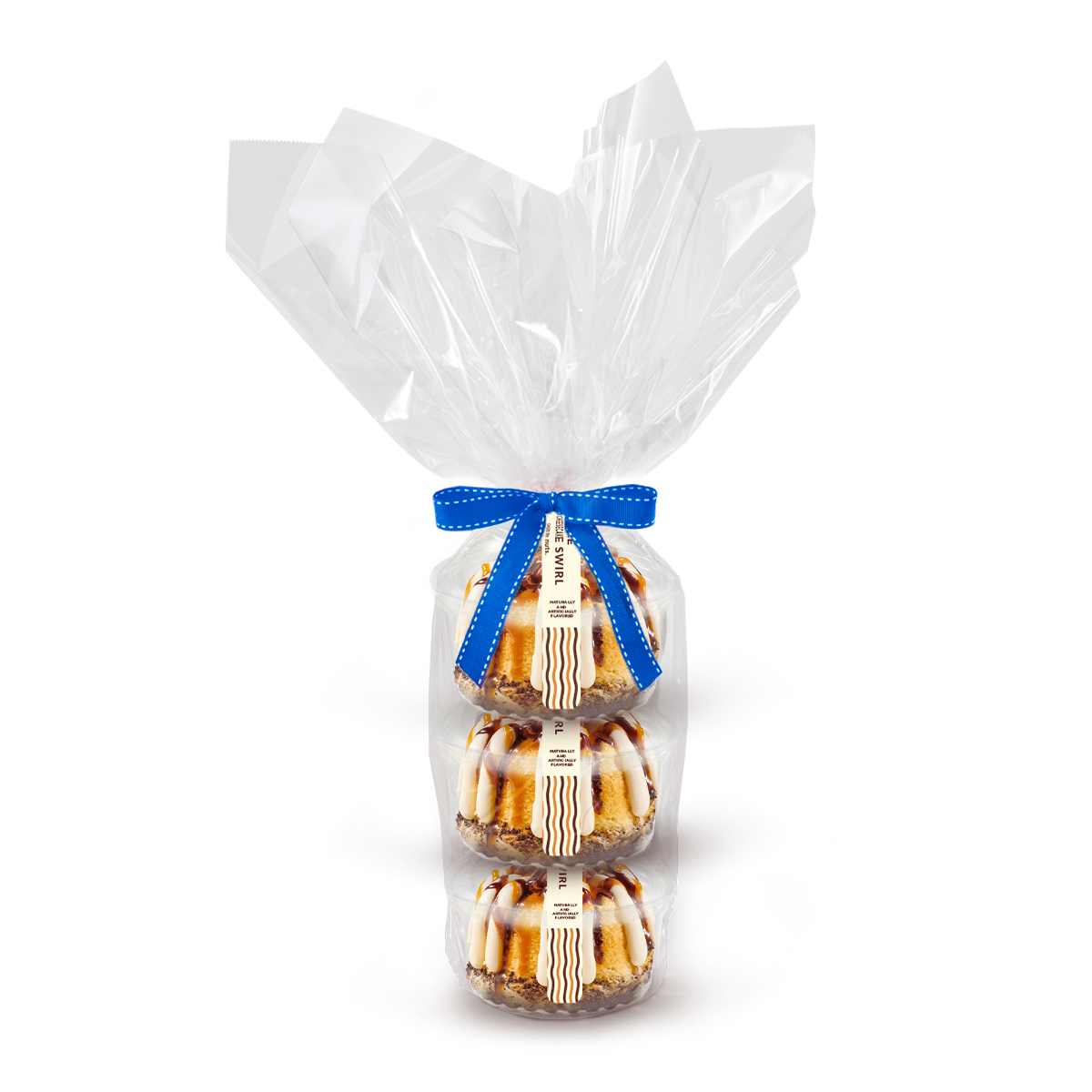 Three individually packaged Turtle Cheesecake Swirl Bundtlet gift wrapped in cellophane with a blue stitched ribbon.