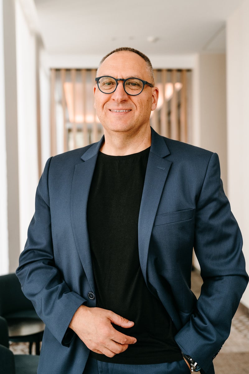 Portrait of a man standing in the office