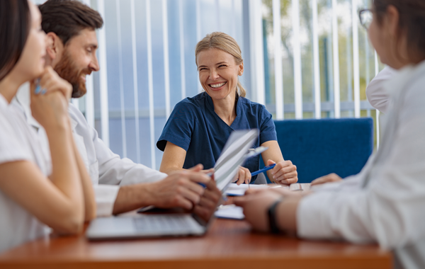 Smiling healthcare team meeting. Medical Science Liaison Training gathering