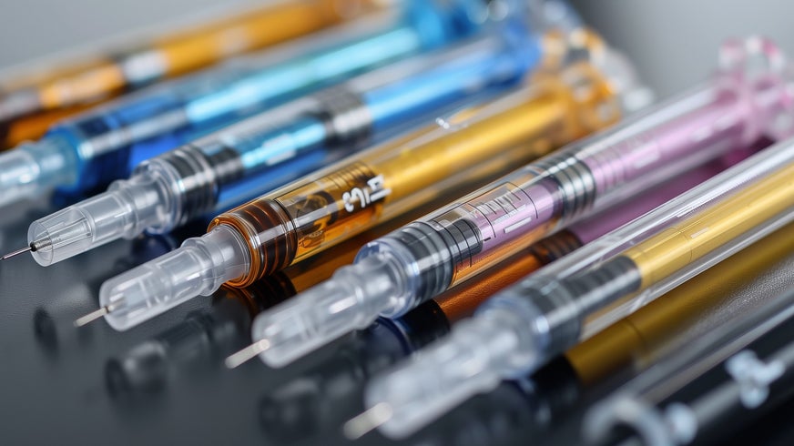 A close up of syringes.