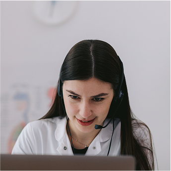 A female medical worker engaging in an online call.