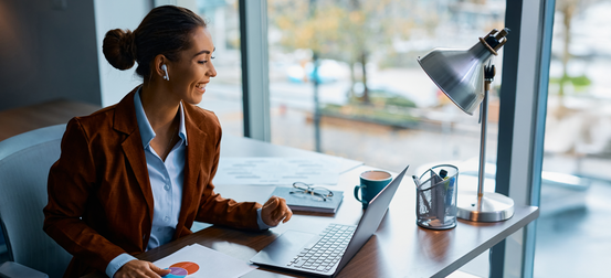 A remote sales representative on a video call with an HCP engaged in a productive conversation with visible medical charts or documents on the screen.