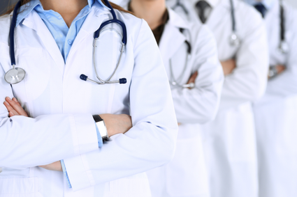 Group of doctors with arms crossed.