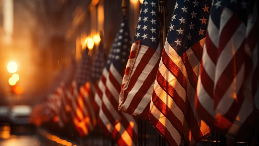 American flags in a cemetery.
