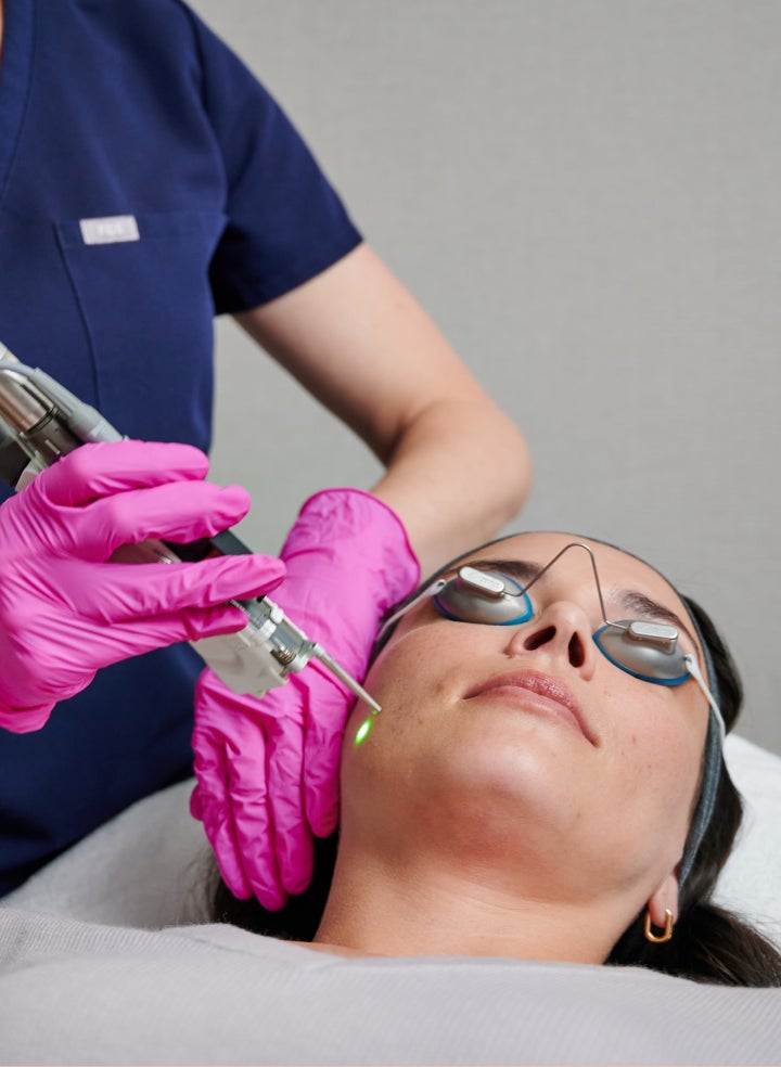 A guest is getting a laser facial at Chapter Aesthetic Studio.