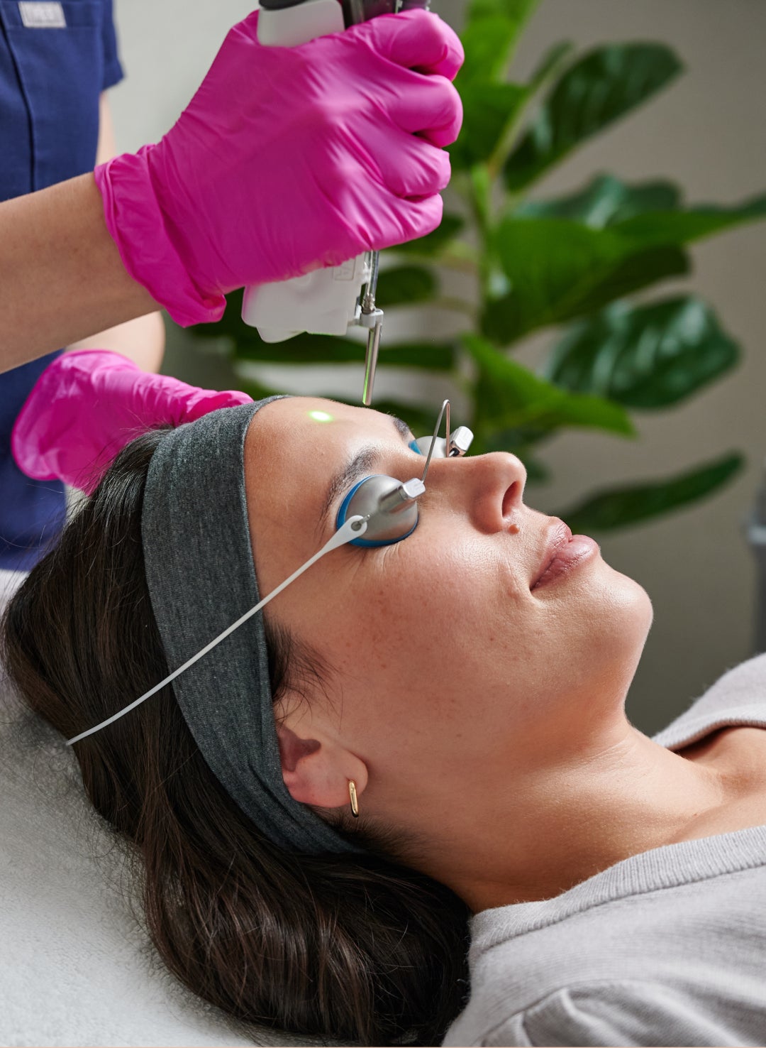 Closeup of guest getting a laser facial treatment at Chapter Aesthetic Studio.