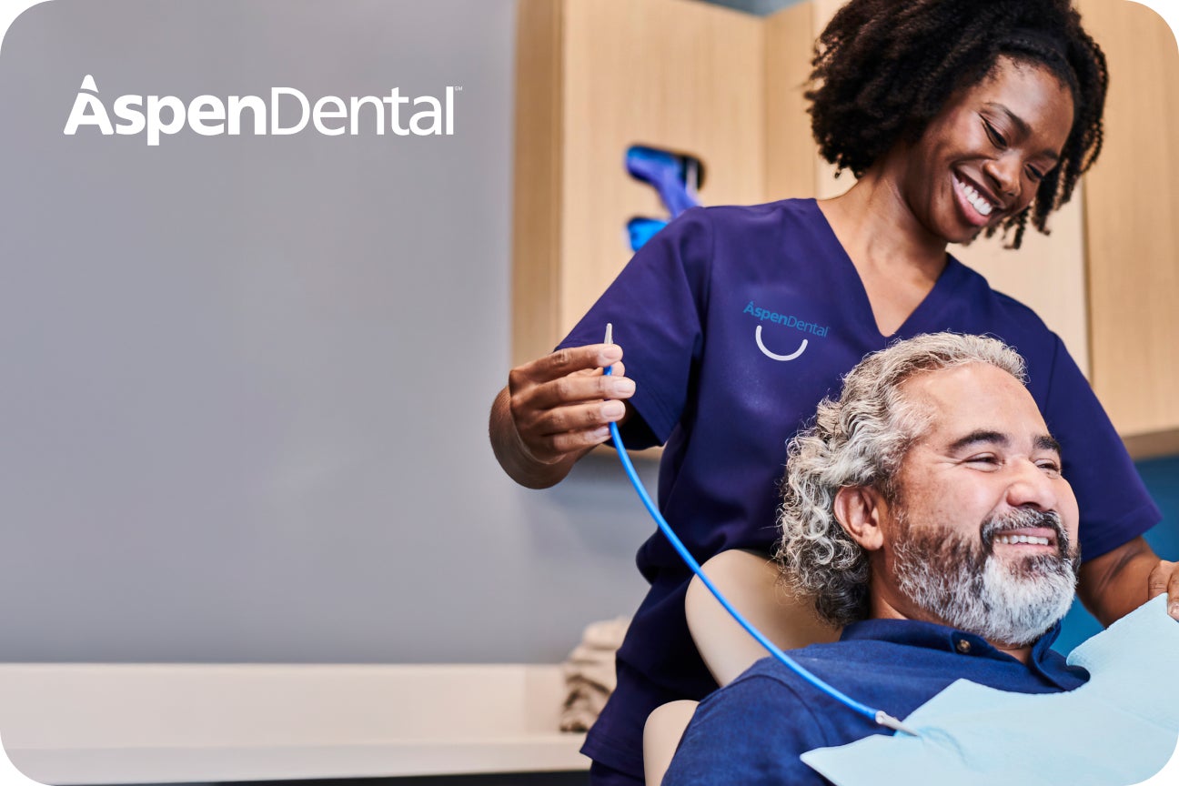 An Aspen Dental patient is being prepared for his dental service by an Aspen Dental clinician.
