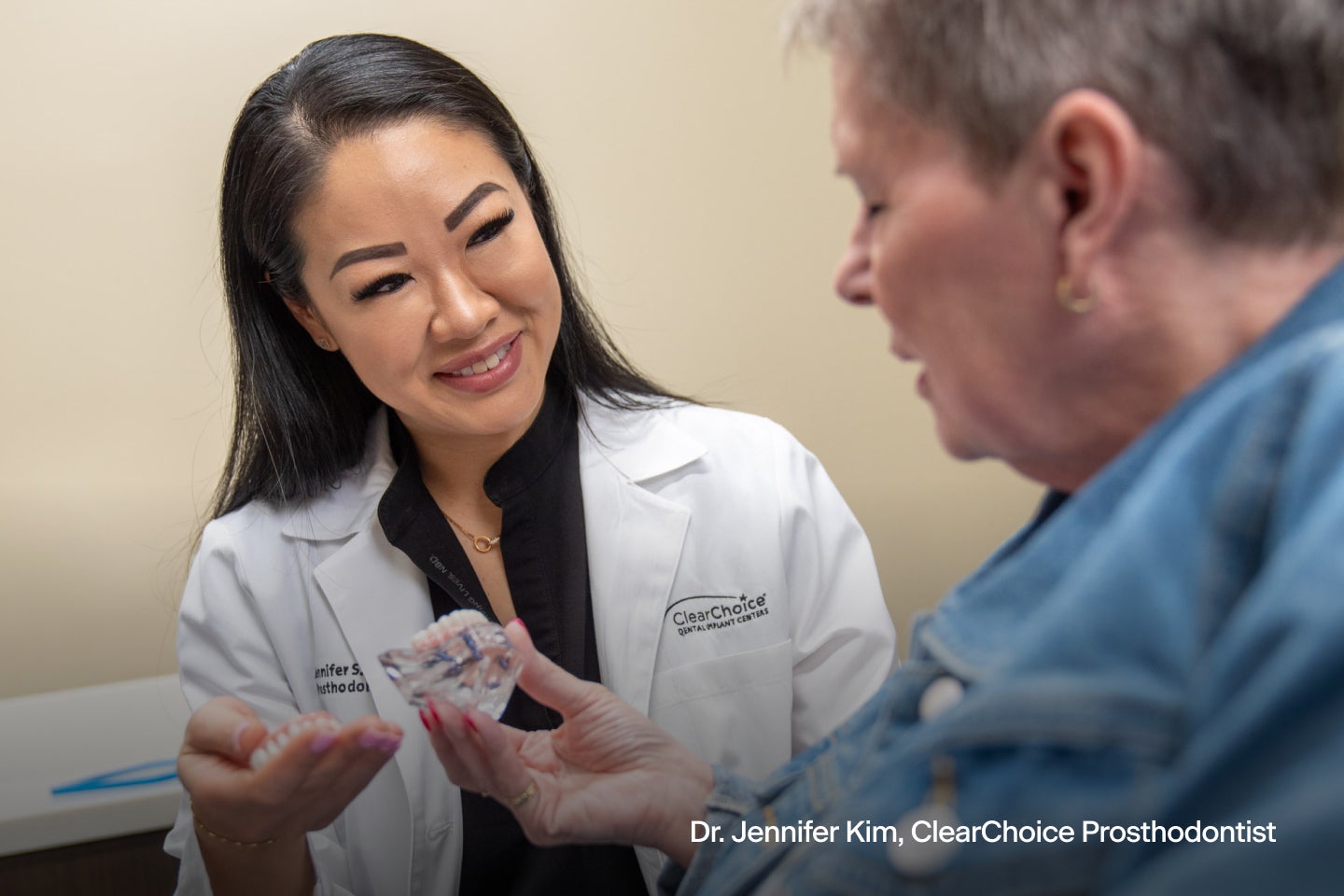 Dr. Jennifer Kim, a ClearChoice Prosthodontist consulting a new dental implant journey.