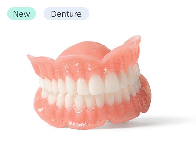 A set of Aspen Dental Signature Elite dentures designed for a natural fit and appearance. The image highlights premium denture solutions for tooth replacement.