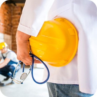 A close up of medical provider from behind, they are wearing a medical jacket and holding a stethoscope, with a construction helmet under their arm.