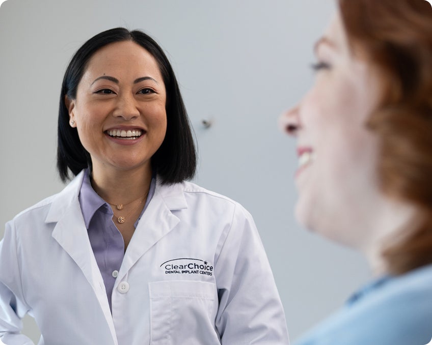 A patient attending her free consultation with a ClearChoice doctor to learn about her treatment eligibility and treatment options.
