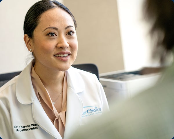 An image of a ClearChoice doctor addressing patient concerns during an appointment.