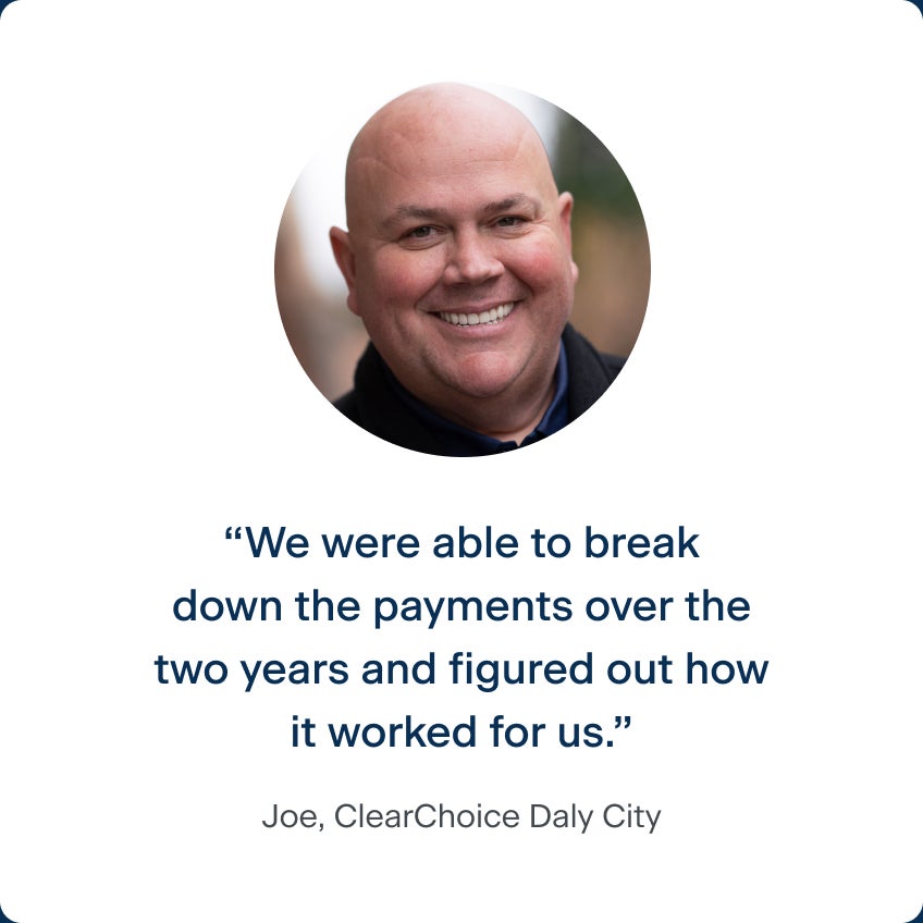 An image of Joe, a patient from ClearChoice's Daly City center, smiling with his new dental implants.