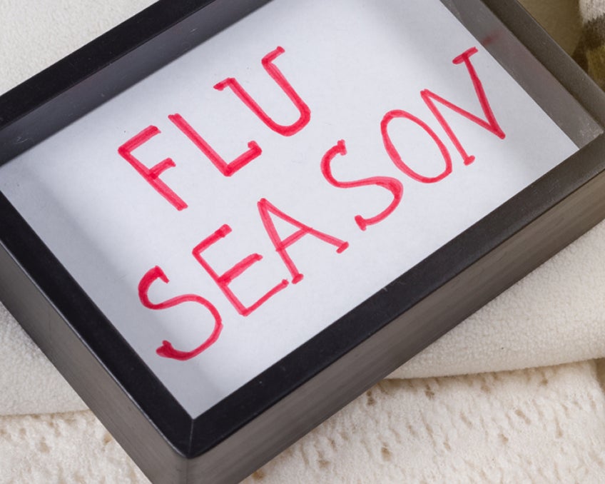 A sign that says "Flu Season".