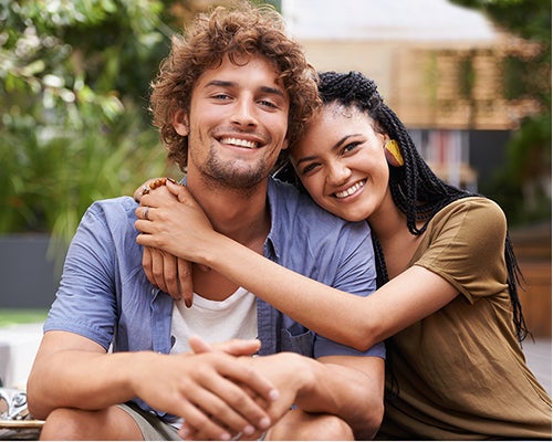 A young couple shares a happy moment together.