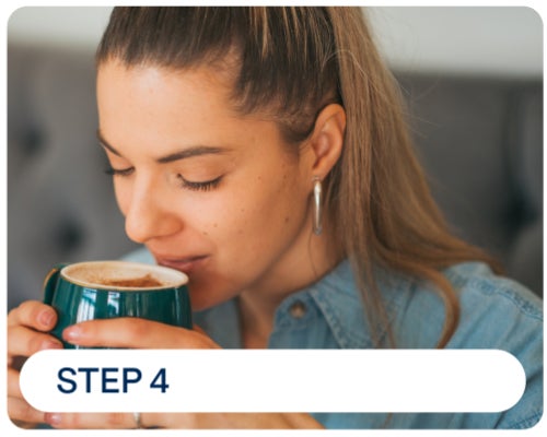  person drinking from a cup, illustrating the need to avoid stain-causing foods and drinks like coffee and tea to keep composite veneers looking their best.