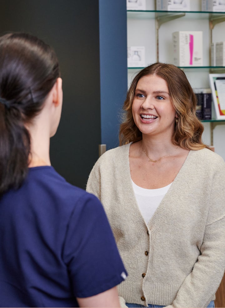 Chapter specialist advises guest on a post-care plan after their microneedling treatment.