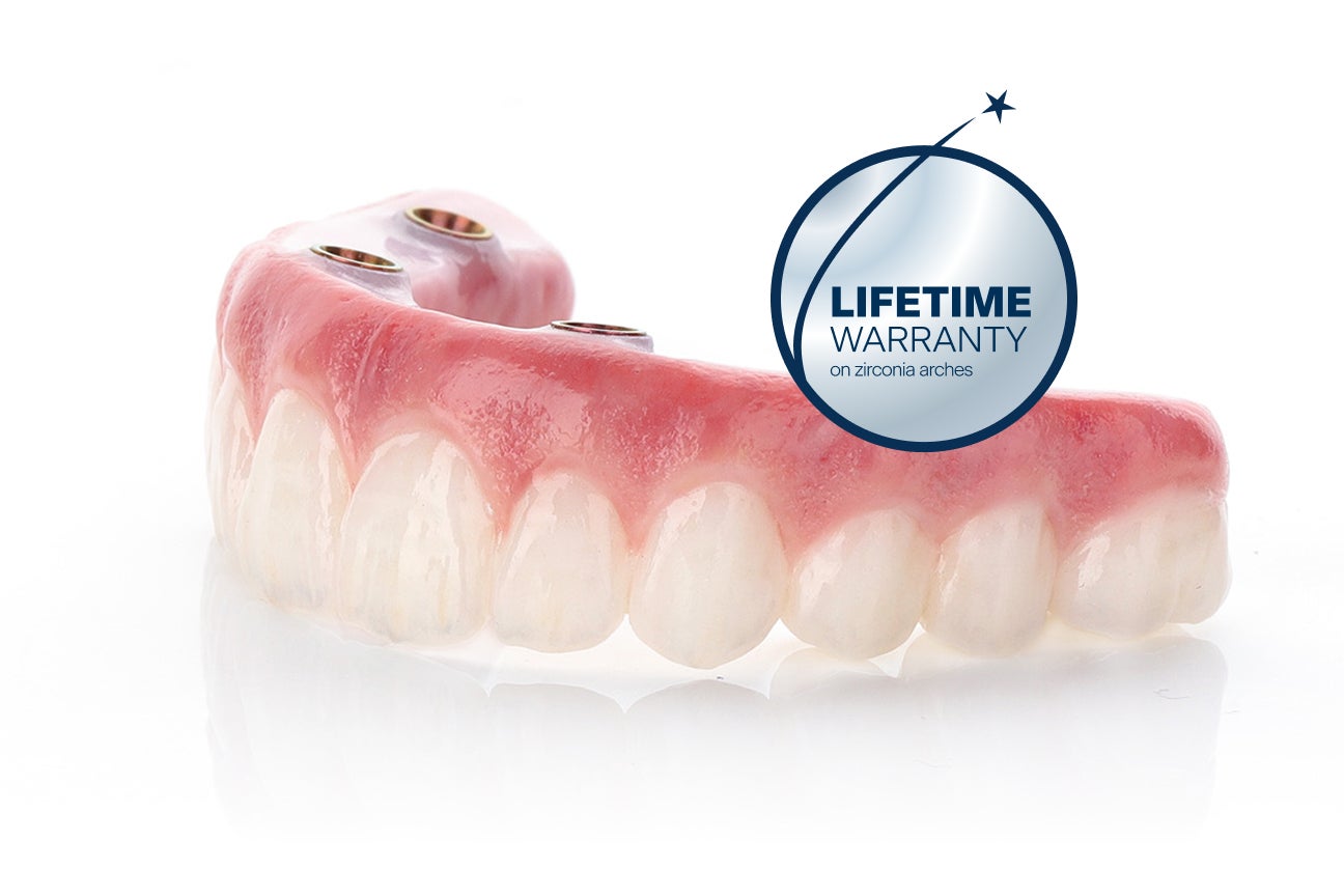 Close up of a zirconia dental arch shows realistic gum and tooth details. It has a circular badge that says,  Lifetime Warranty on zirconia arches. This highlights ClearChoice’s long-term promise to provide quality implants for patients.