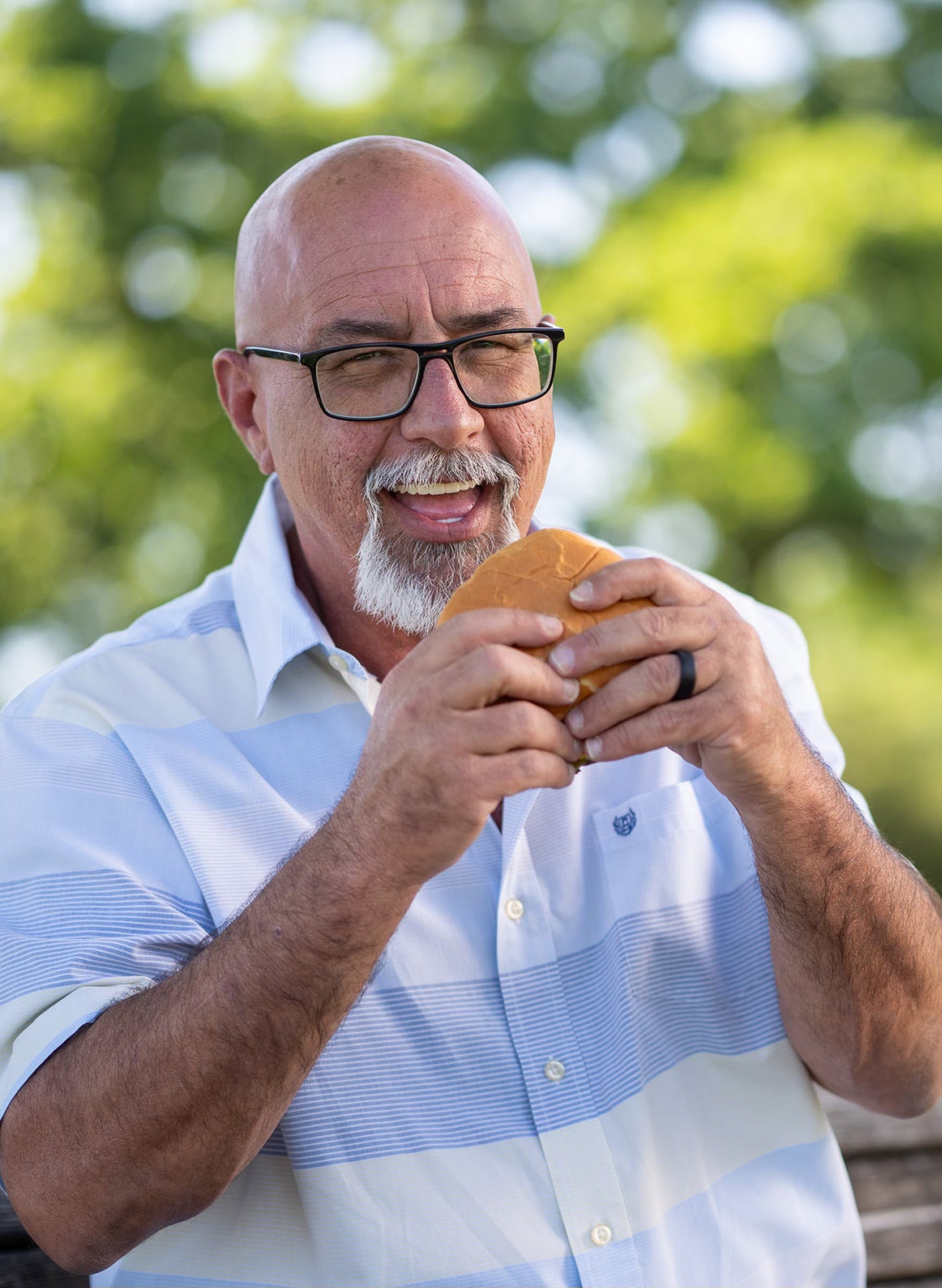 ClearChoice patient enjoying his favorite foods again after his chewing abilities were restored with dental implants.