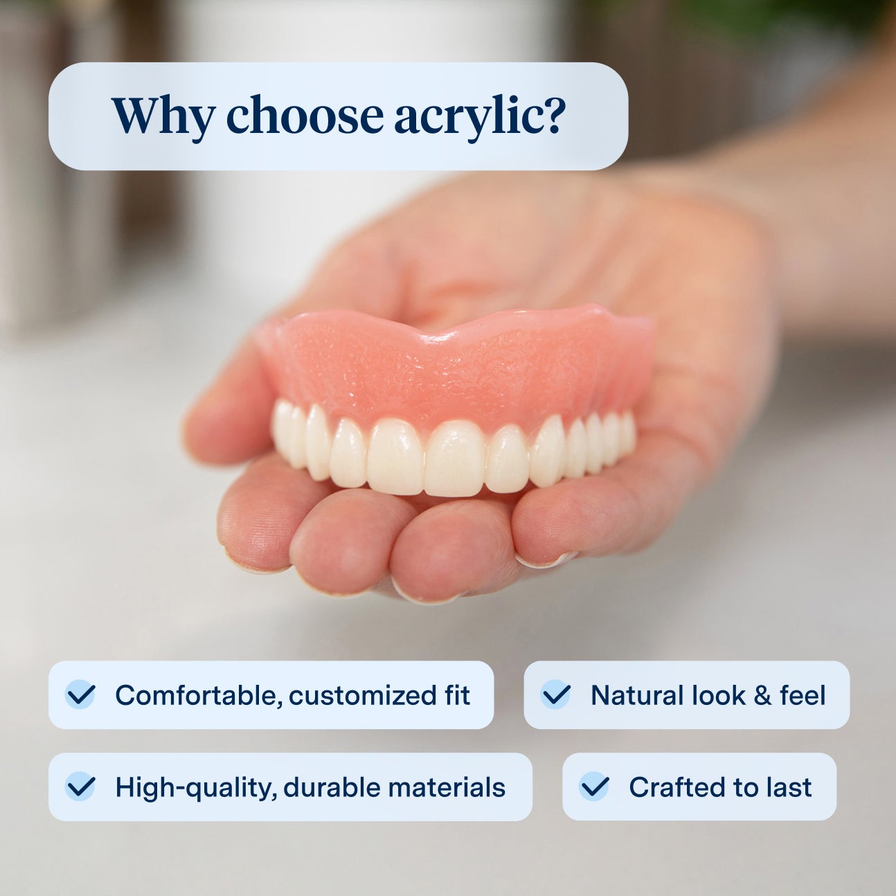 A hand holds a set of acrylic dentures, showcasing their natural look and comfortable fit. Text highlights the benefits of acrylic dentures, including durability, customization, and a lifelike appearance.