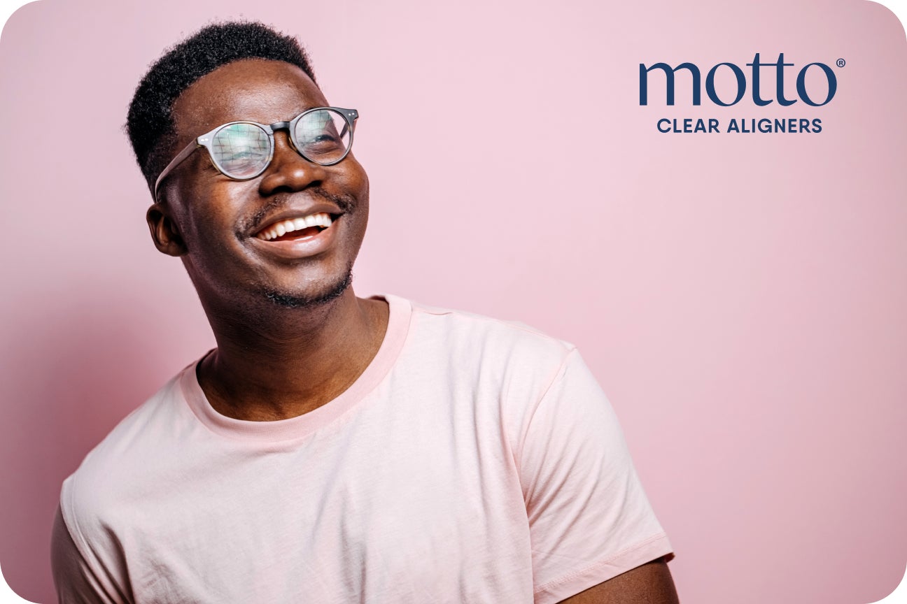 A Motto Clear Aligners patients is revealing his smile after completing his treatment.