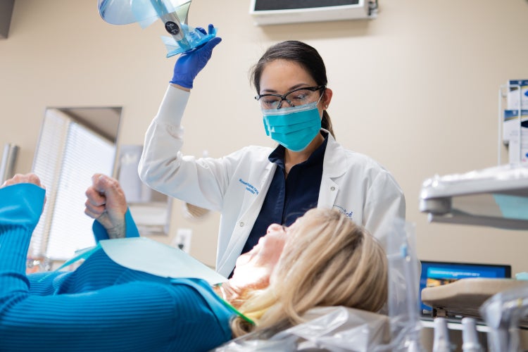 A ClearChoice doctor completing a successful dental bone graft.