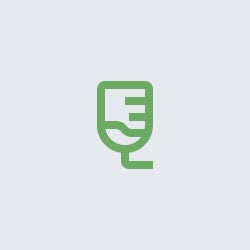 A green icon of an IV bag on a white background